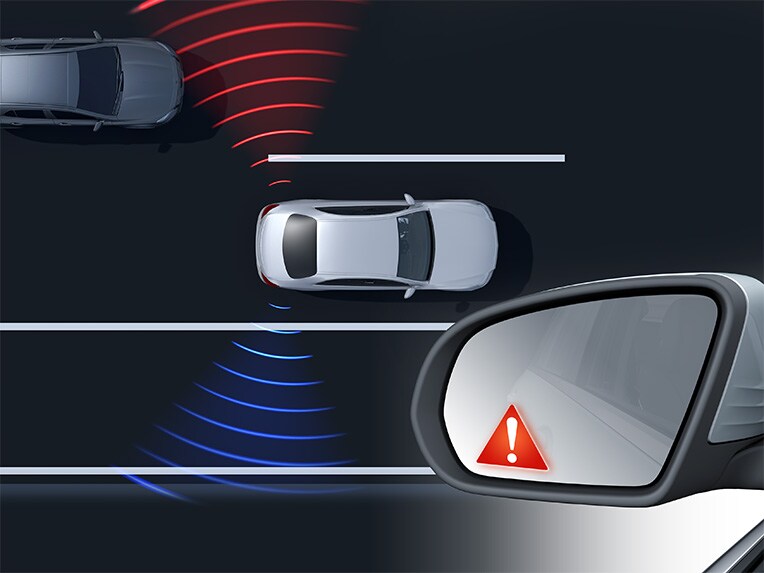 An exterior mirror of the Mercedes-Benz E-Class Coupé.