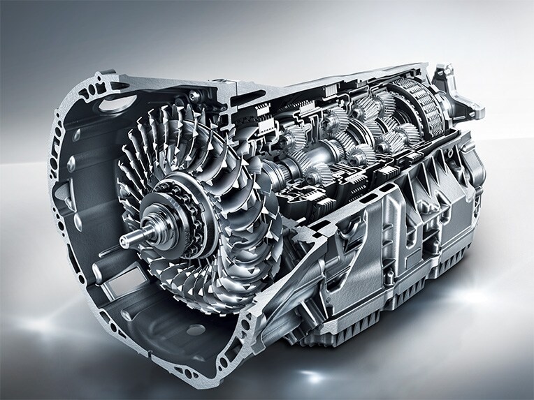 The image shows the 9G-TRONIC automatic transmission of the Mercedes-Benz E-Class Coupé.