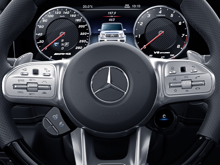 The AMG steering wheel buttons in the Mercedes-AMG G-Class.