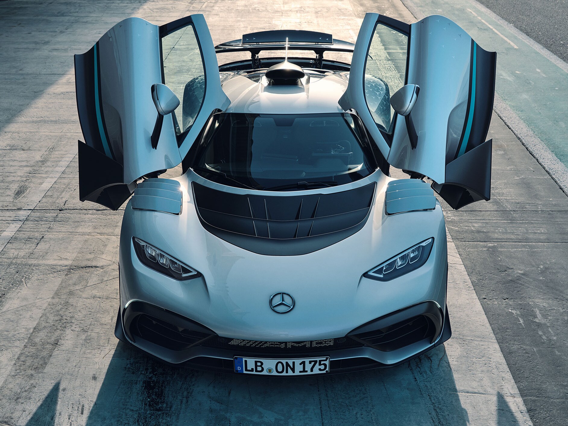 Front view of the Mercedes-AMG ONE with the doors open.