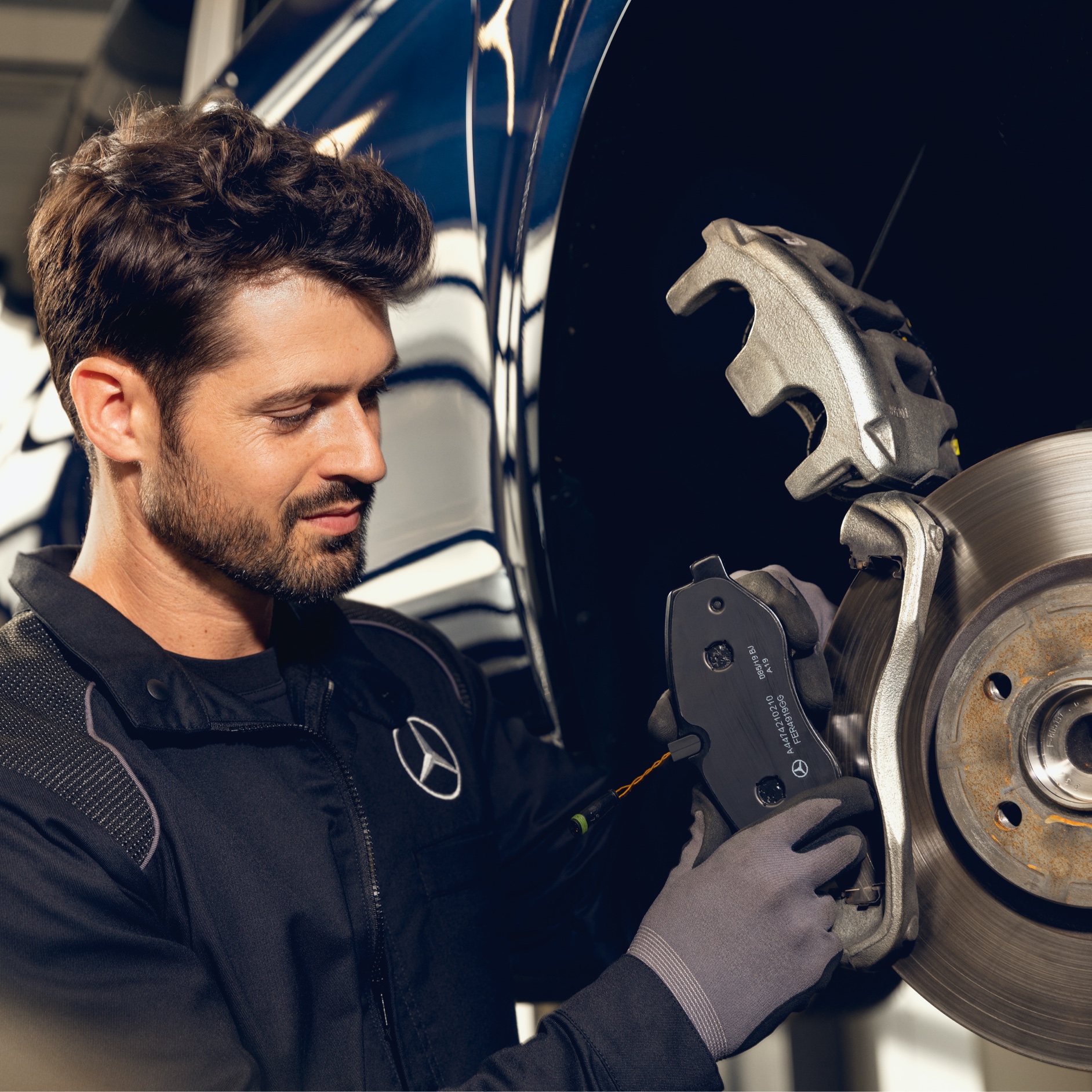 As new as the original: The original | Genuine Parts | Mercedes-Benz A Mercedes-Benz technician checks the brakes of a vehicle on the test bench.