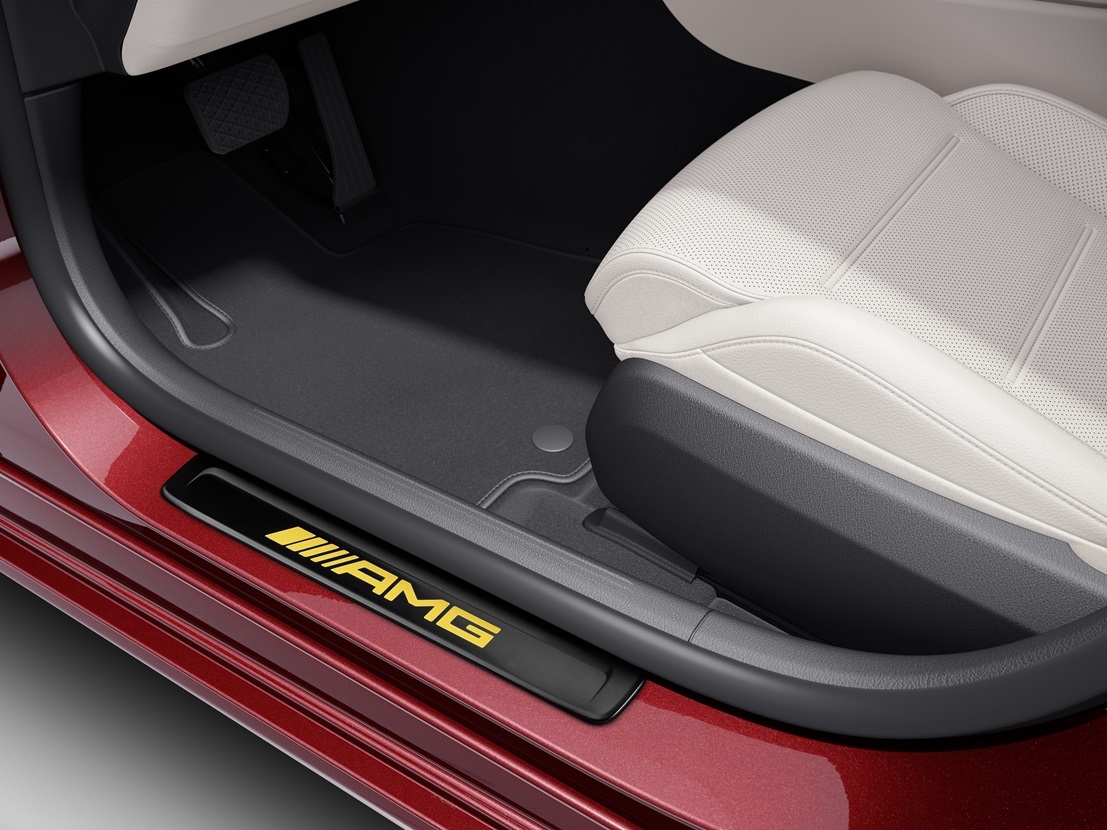 Boarding with style | Accessories | Mercedes-Benz A red Mercedes-Benz fitted with an AMG interchangeable cover with yellow lettering.