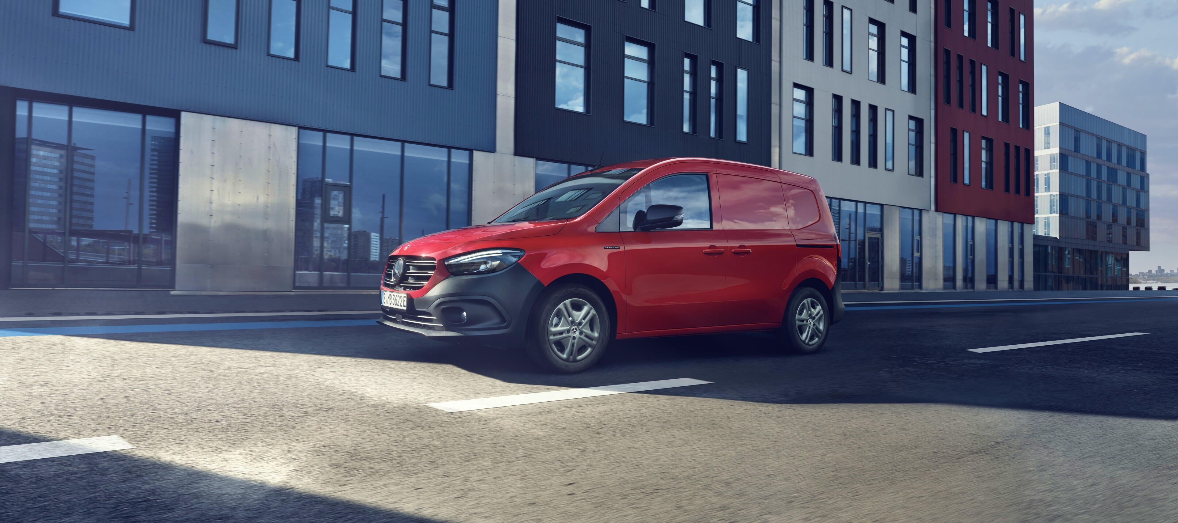 eCitan panel van | Mercedes-Benz Vans The eCitan panel van, a small electric van from Mercedes-Benz, driving along a downtown street.