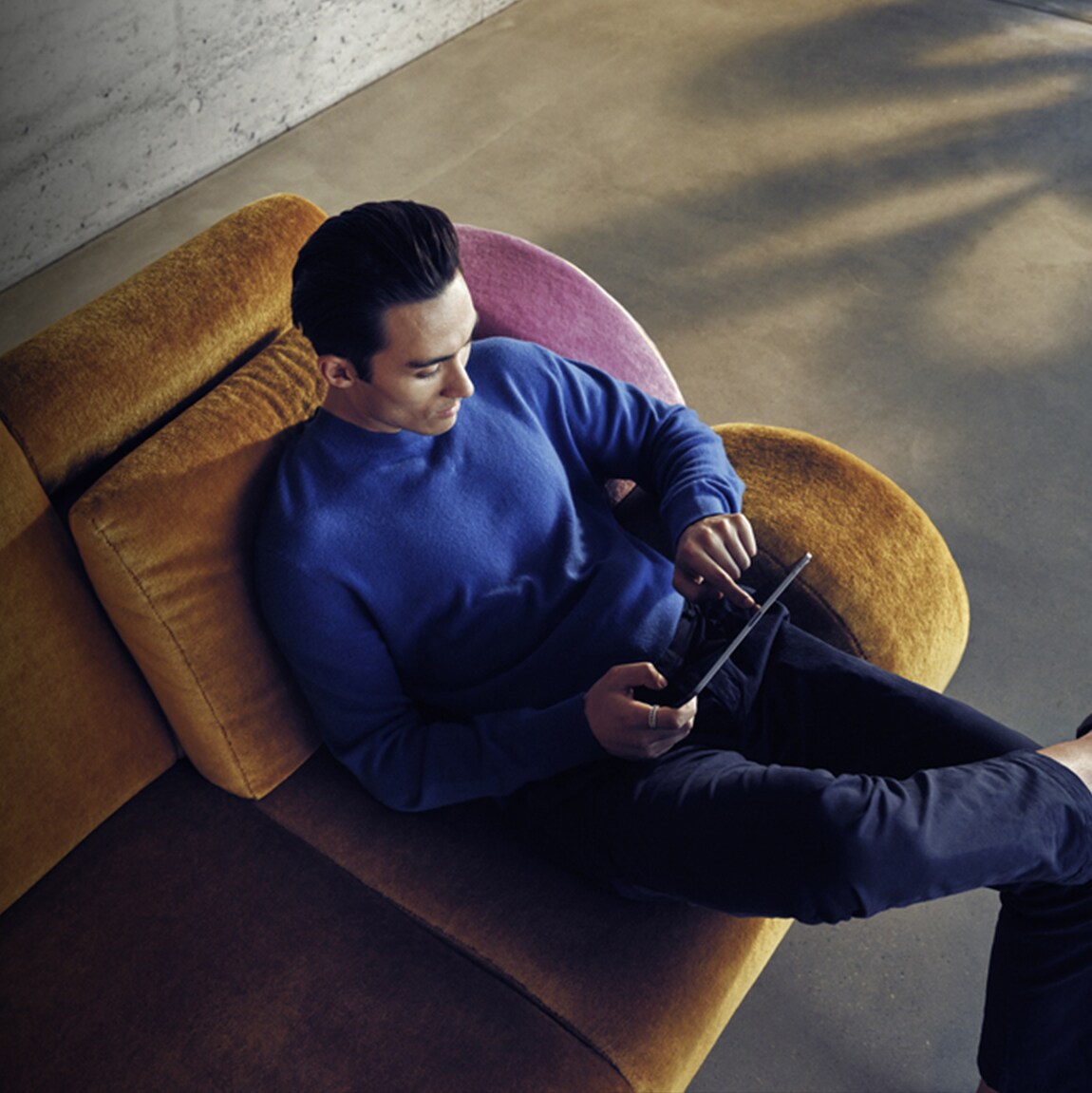 Man is looking at iPad